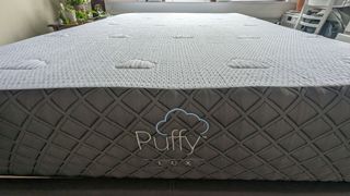 Side view of Puffy Lux Hybrid mattress