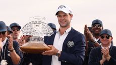 Thomas Detry poses with the WM Phoenix Open trophy after winning in 2025