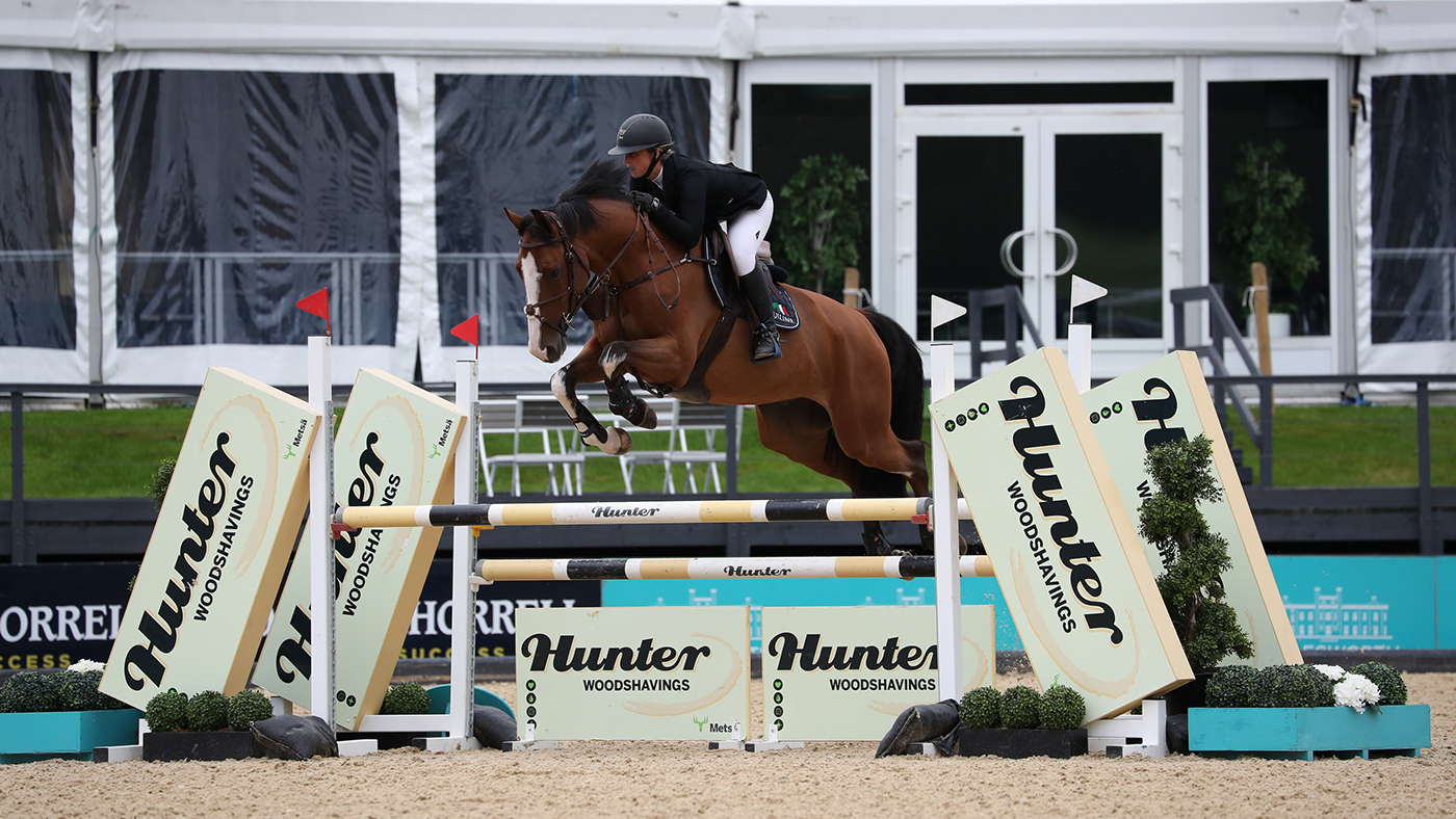 Megan James and Labatt win the five year olds ar Bolesworth Young Horse Championships