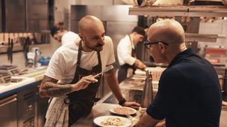 Trippa chef and Stanley Tucci in the kitchen in Tucci in Italy