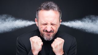 frustrated man with steam coming out of his ears