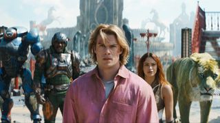 Roboto (Kristen Wiig), Man At Arms (Idris Elba), Adam (Nicholas Galitzine), Teela (Camila Mendes) and Cringer in "Masters of the Universe" film (2026)