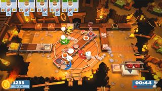 Three chefs cooking in a dangerous kitchen during the game Overcooked 2.