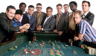 Ocean's Thirteen the entire gang crowds around a Craps table
