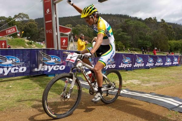 Rowena Fry celebrates her victory in the cross country at Glenorchy MTB Park.