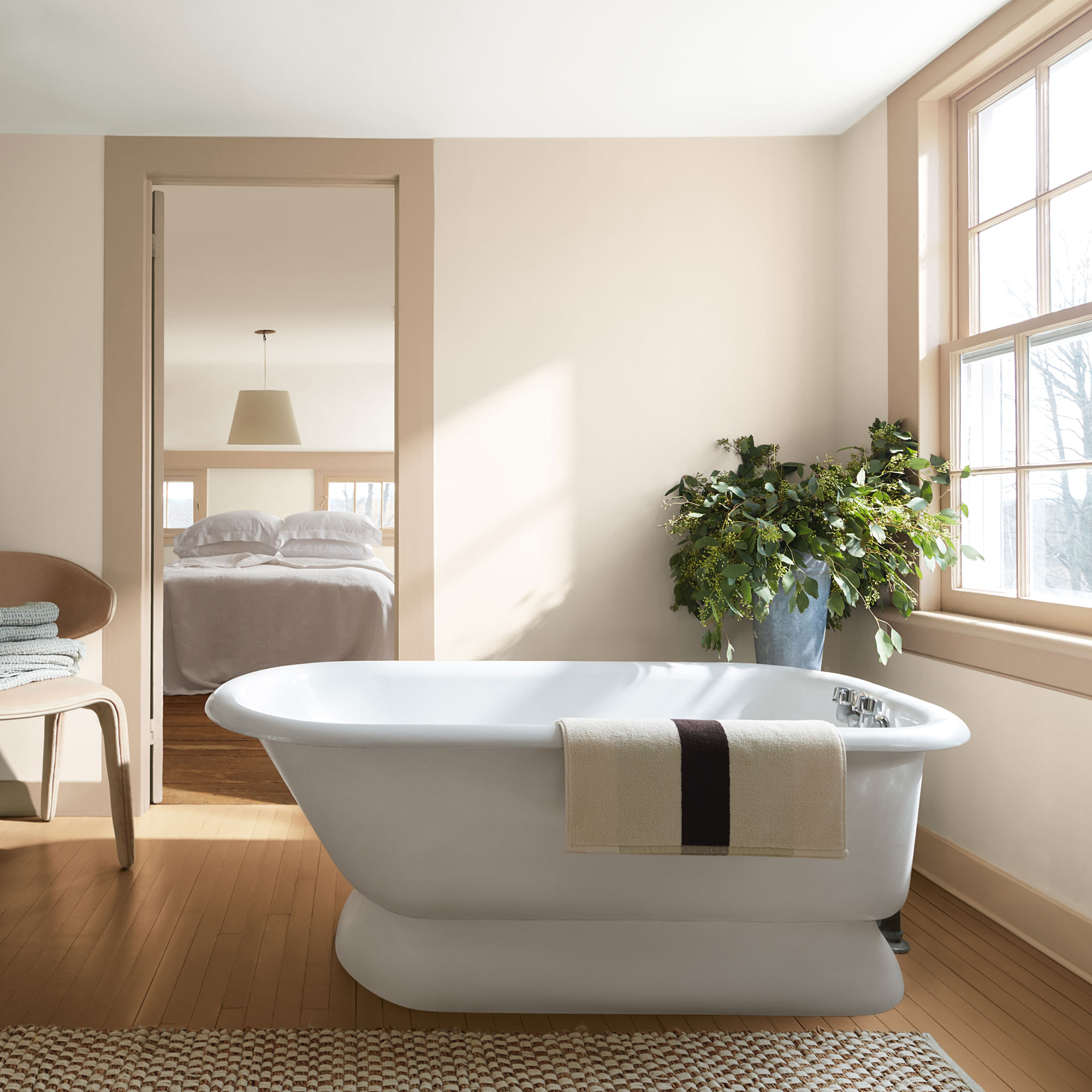 fresh neutral bathroom with chunky freestanding bath