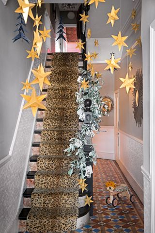 Hallway with leopard print runner and hanging star decorations