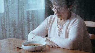 Elderly woman with appetite loss