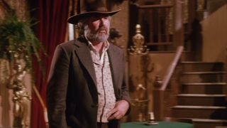 Kenny Rogers in a cowboy outfit in The Gambler.