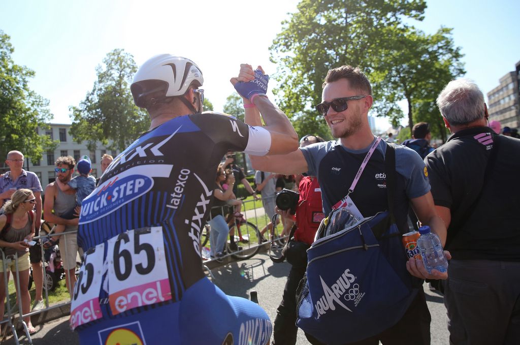 Anthony Pauwels celebrates with Fabio Sabatini following Marcel Kittel's stage 3 win at the Giro in May