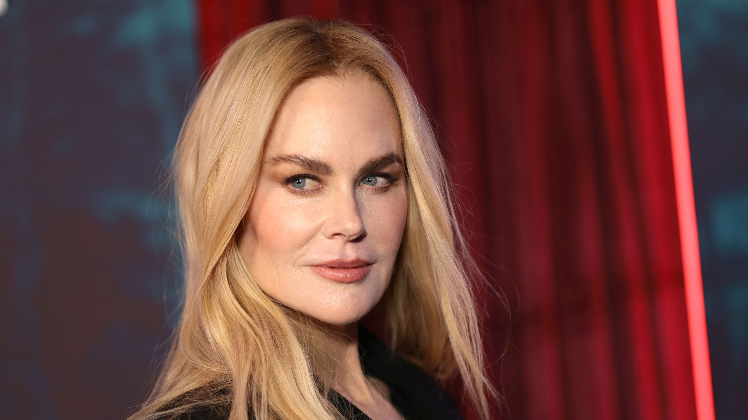 nicole kidman on a red and blue background