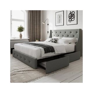 Upholstered storage bed in gray with button detailing