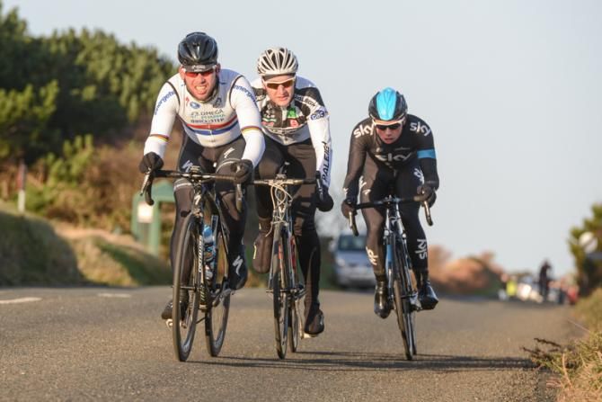 Mark Cavendish leads the break, which includes Peter Kennaugh and Continental rider Mark Christian