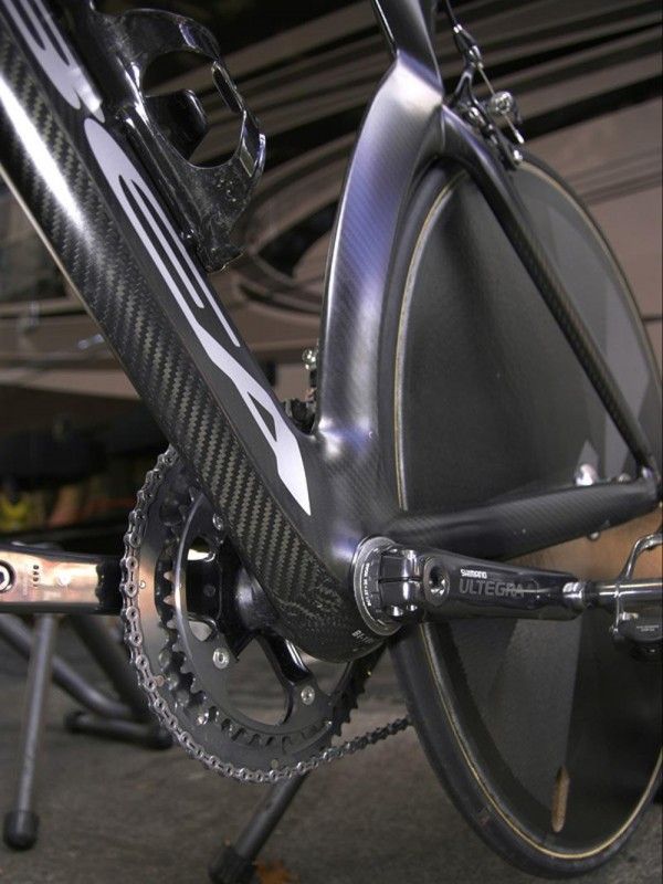 Orbea extends the down tube a bit below the shell to help shield the rear wheel while the chain stays are situated nearly level.