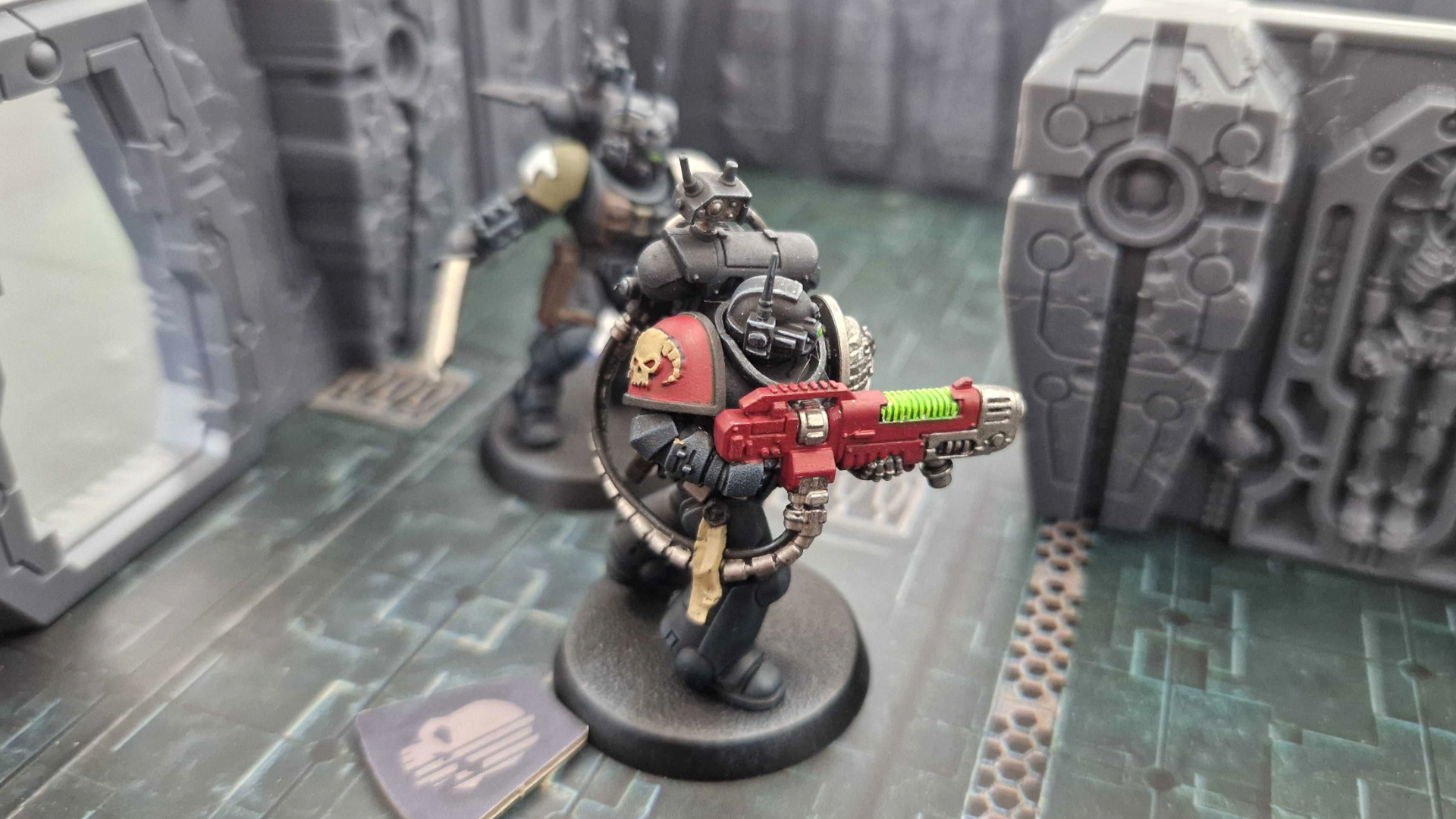 Deathwatch models advance in the corridors of a Tomb World