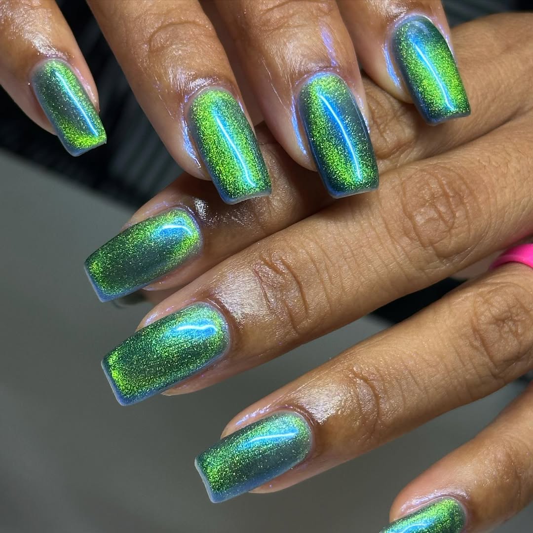 green cat eye manicure