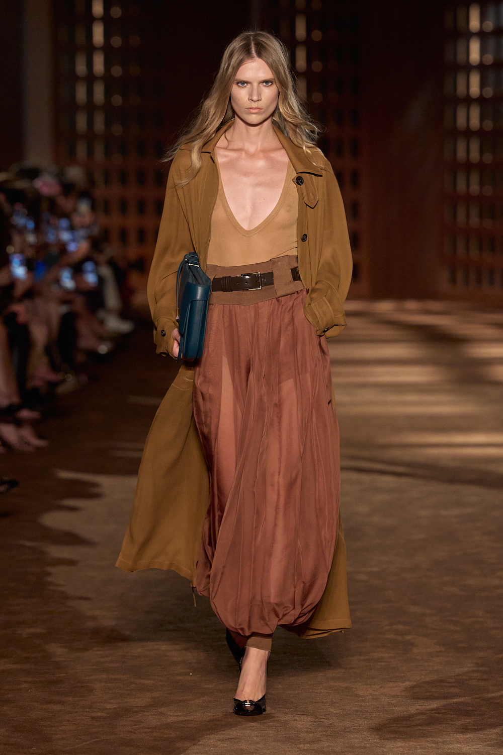a model walks the ferragamo spring 2027 runway.