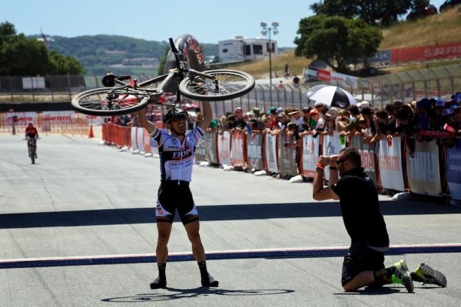 A true outburst of joy by Miguel Martinez (FRM) and team manager at the finish line of XC 2013 Sea Otter pro men's race.