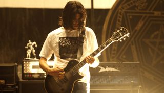 Adam Jones performs with Tool at the Shoreline Amphitheatre in Mountain View, California on August 16, 1997