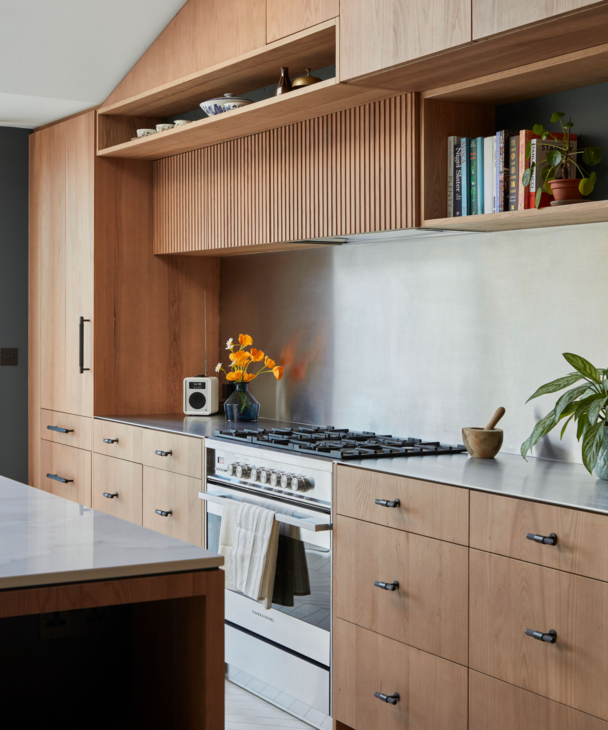 modern wooden kitchen with fluted cabinets
