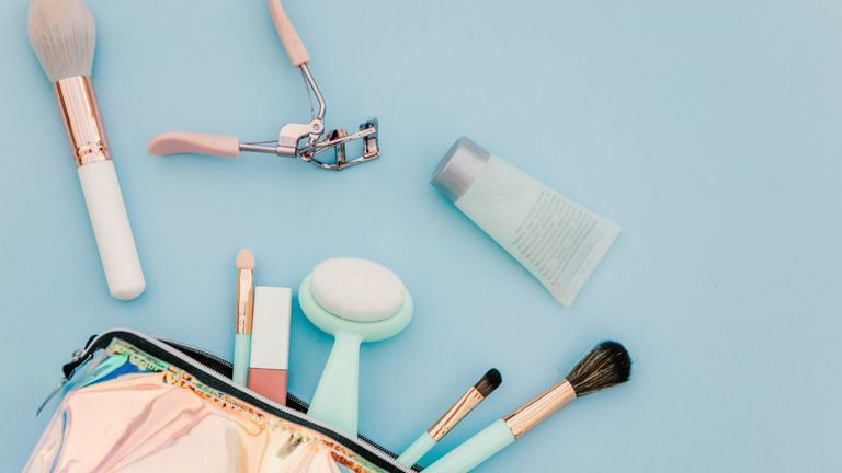 Makeup bag with cosmetics and applicators