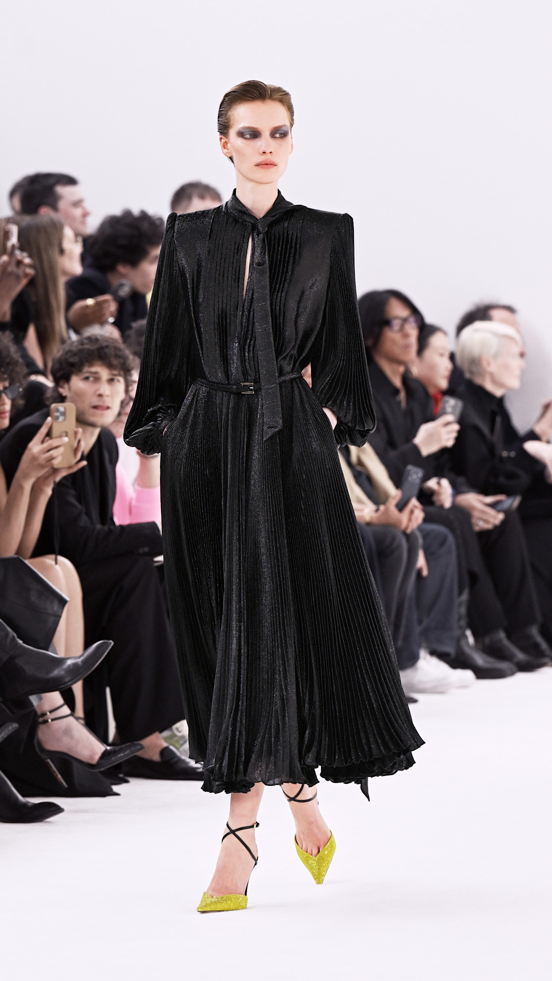 tom ford model walks the runway.