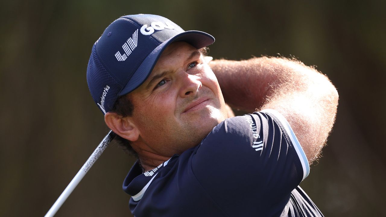 Patrick Reed takes a tee shot at the 2023 Dubai Desert Classic