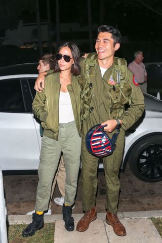 Henry Golding dressed as Top Gun