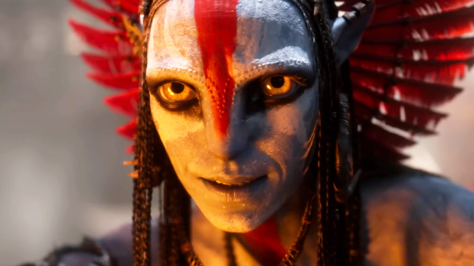 A close-up of Varang half-smiling in Avatar: Fire and Ash