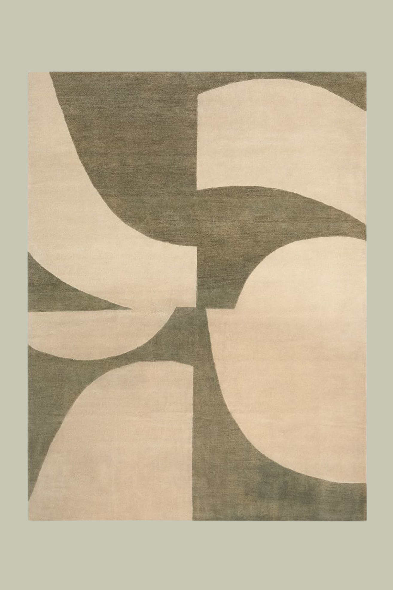 A green and beige geometric rug