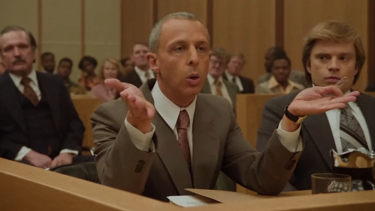 Jeremy Strong gestures in court as Martin Donovan and Sebsatian Stan watch on in The Apprentice.