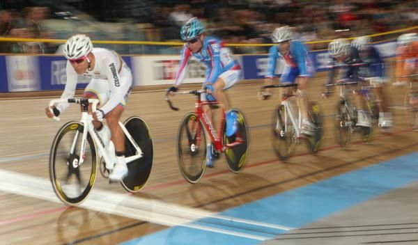 Edwin Avila (Colombia) defends his gold medal winning lead by riding on the front in the final stages of the race.