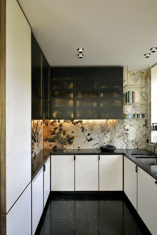 kitchen cabinetry at refreshed modernist villa nisot