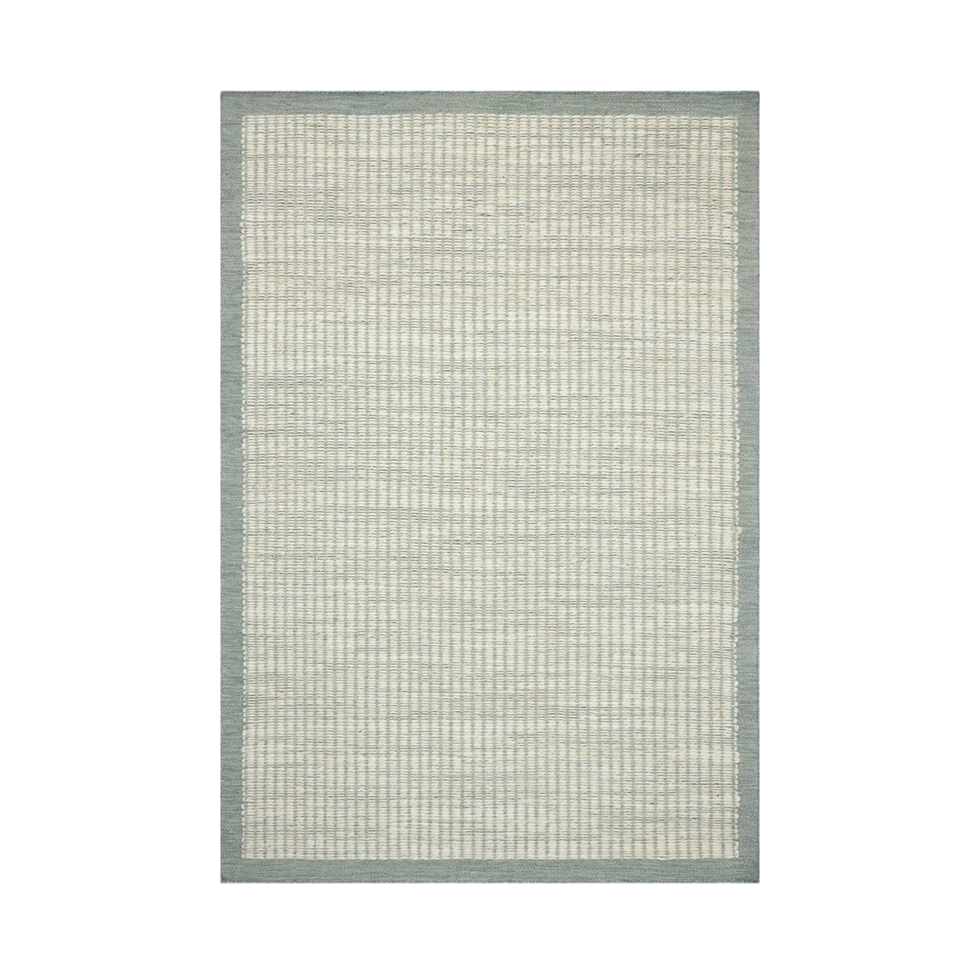 a jute rug in light blue