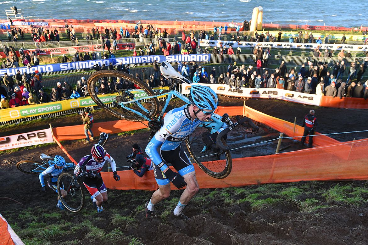 Michael Vanthourenhout leads the chasing group up the climb