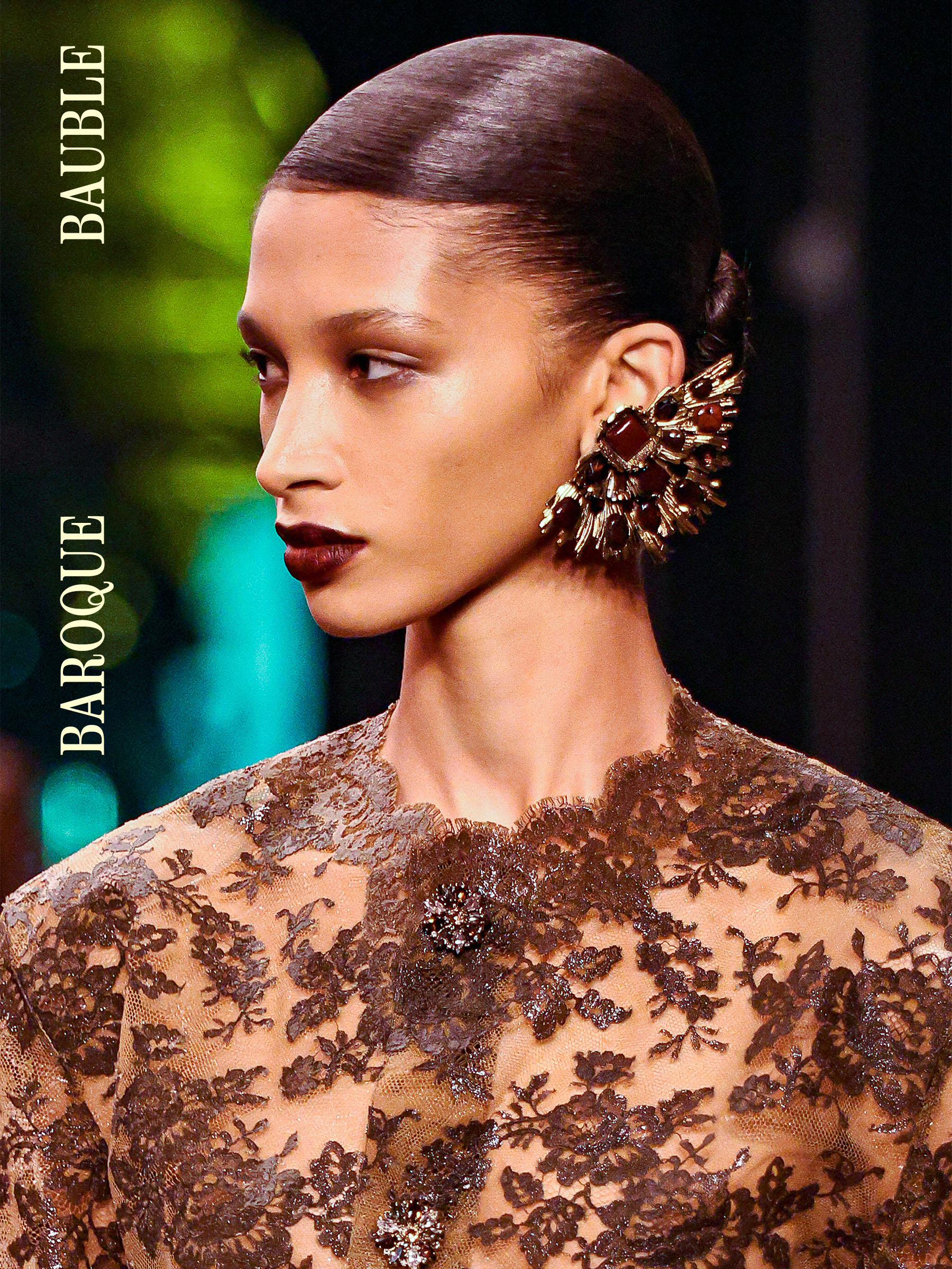 Woman wearing a statement earring from the Saint Laurent FW26 collection