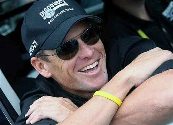 Good times: Lance Armstrong enjoyed watching Contador win in Paris,