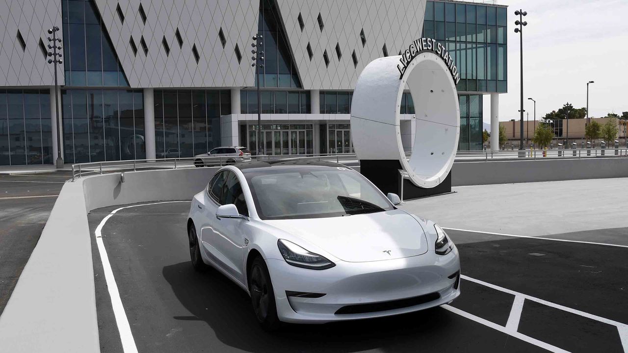 A white Tesla vehicle