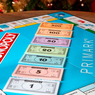 monopoly money with shopping board game