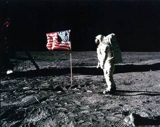 Buzz Aldrin salutes the U.S. flag on the surface of the moon during the Apollo 11 mission on July 20, 1969. Some conspiracy theorists believe that NASA faked the landing.