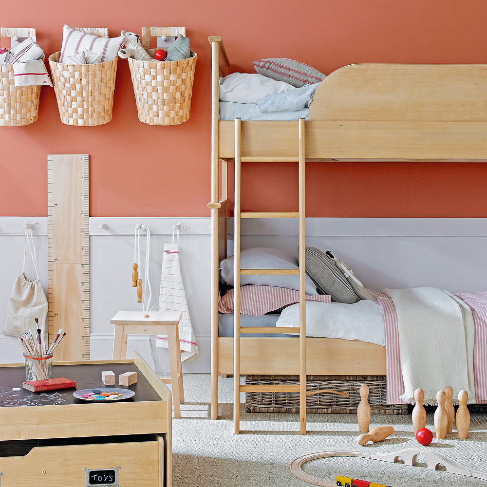 bedroom with bunk bed and hanging storage baskets
