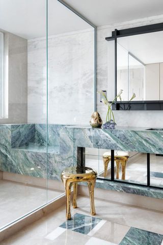 modern marble bathroom with built in seat