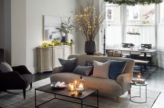 Cozy living room decorating for New Year with candles