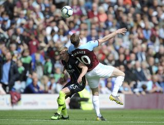 Oleksandr Zinchenko, left, helped City to a crucial win over Burnley on Sunday