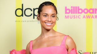 Alicia Keys with a short braided style