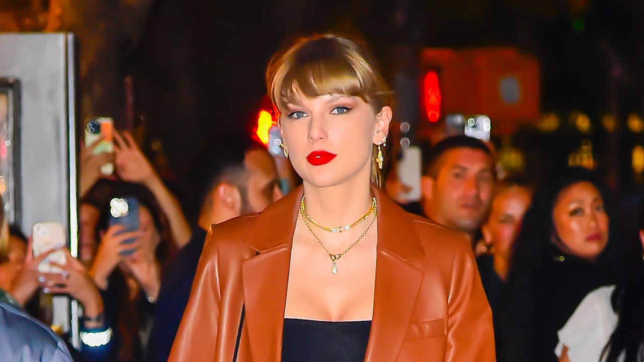 Taylor Swift wears a leather blazer