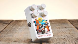 An Electro Harmonix Canyon delay pedal on a wooden table