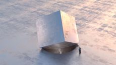 Giant cube stuck in a round-shaped hole with man watching on.