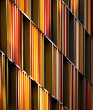 Autumn coloured batons on wall design