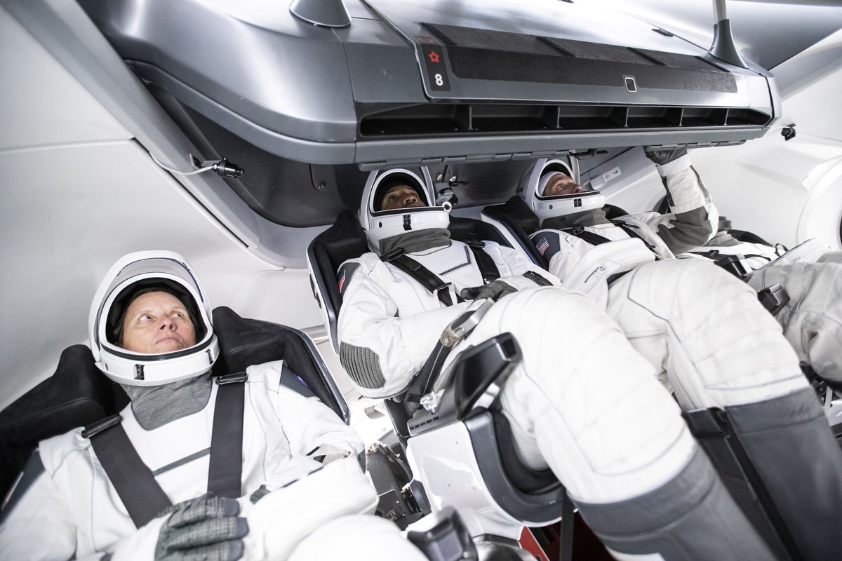 The four astronauts that will fly on SpaceX&#039;s Crew-1 mission to the International Space Station train for their spaceflight inside a Crew Dragon mockup.